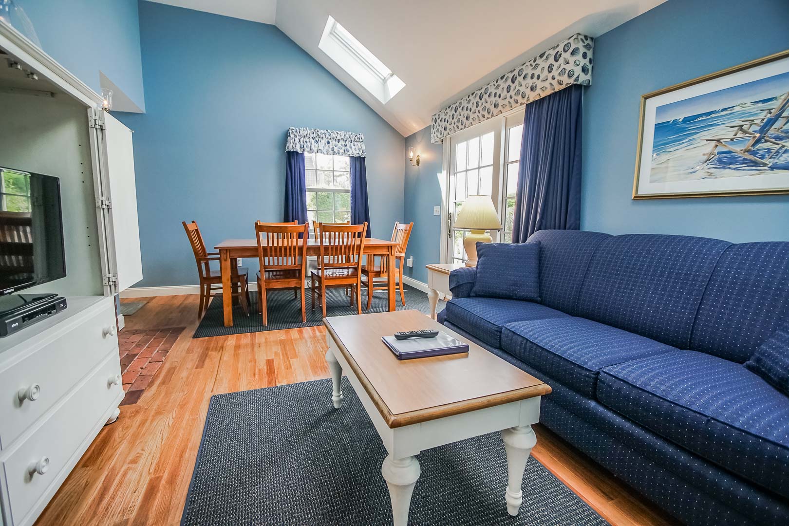 A spacious living room area at VRI's Beachside Village Resort in Massachusetts.